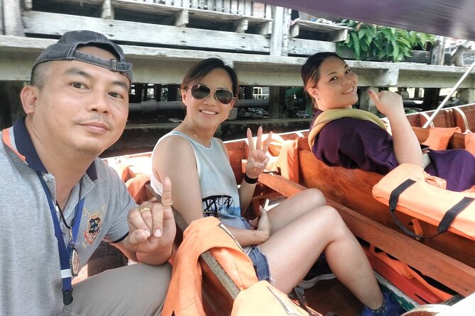 Amphawa and Railway Markets with Boat Ride Group Tour - Amphawa after dark
