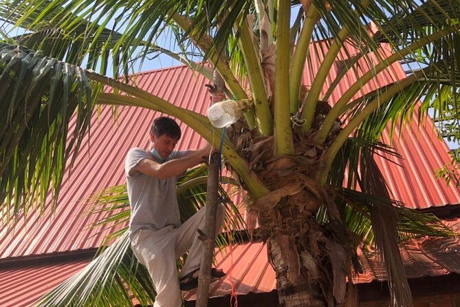 Amphawa Boat Ride & Railway Market: Multi-Lang Private Tour - Wat Bang Kung and the banyan-covered hall