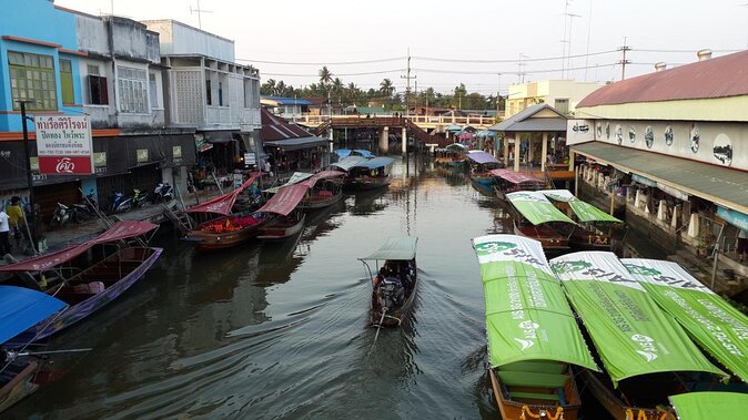 Amphawa Floating Market & Maeklong Railway Train Market Tour - The train that cuts through Maeklong Market