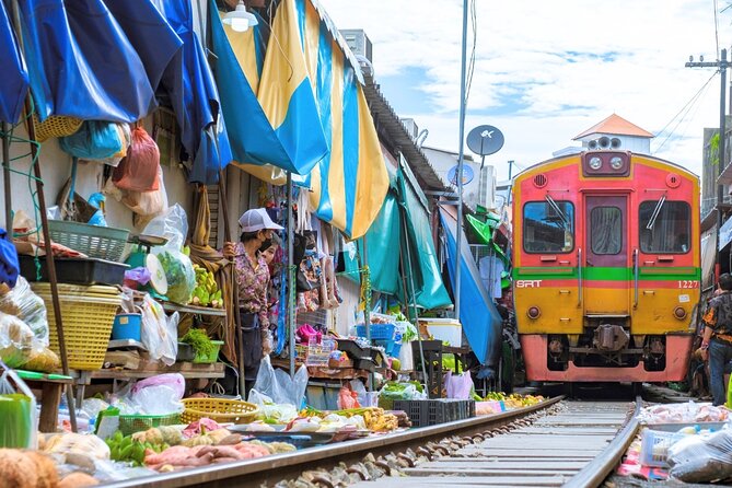 Amphawa Floating Market & Maeklong Railway Train Market Tour - Wat Bang Kung and its tree-wrapped shrine