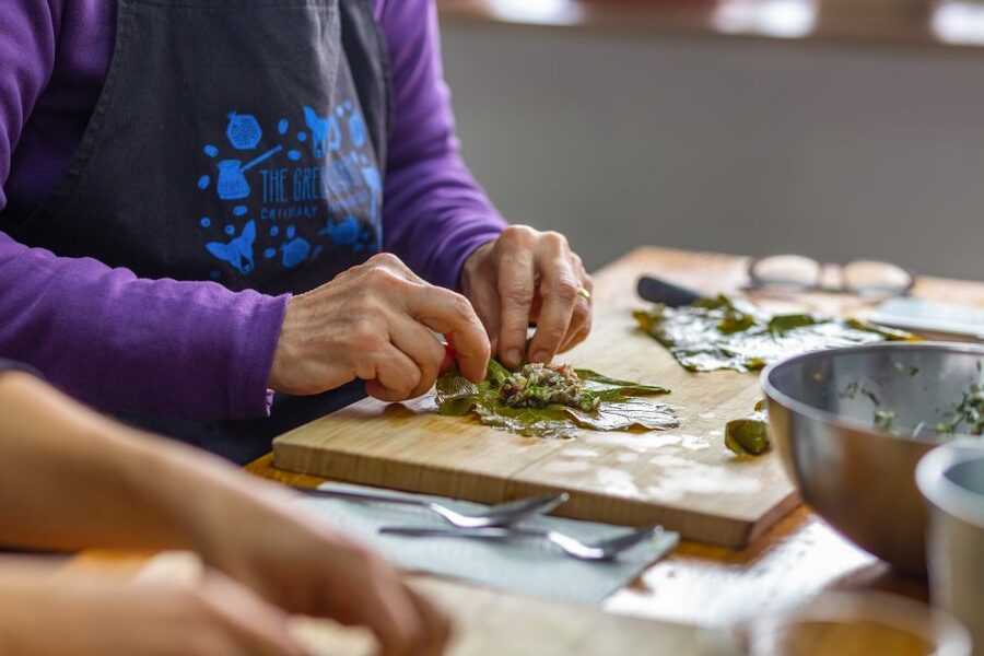 Athens: Food Market Visit and Cooking Class with Wine - Five Greek dishes, one busy shared table