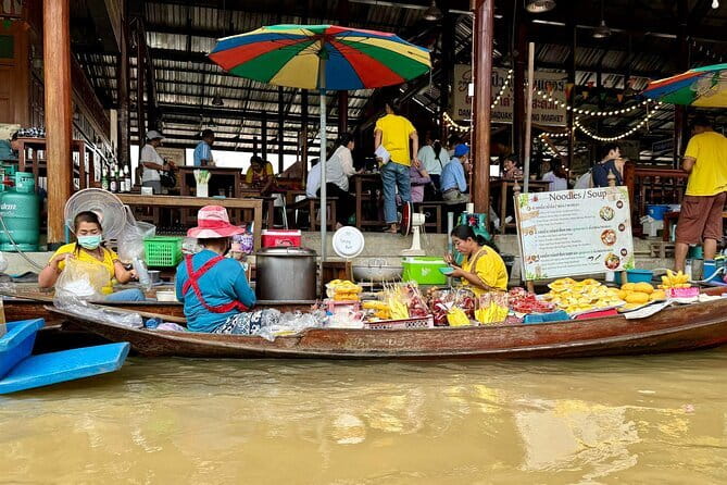 Bangkok: Floating Market & Train Market Discovery - A train that runs through the market