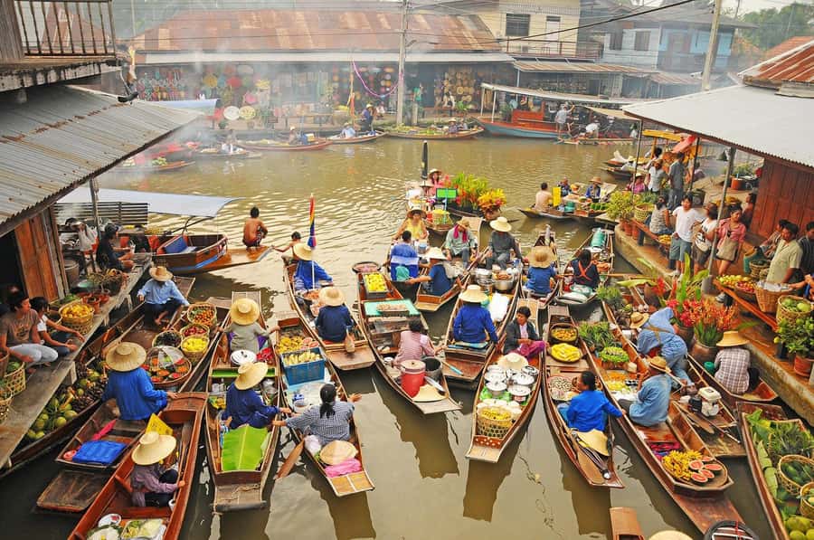 Bangkok: Maeklong Train Market & Floating Market Day Tour - Damnoen Saduak Floating Market: start on the water