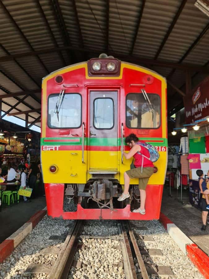 Bangkok: Maeklong Train Market & Floating Market Day Tour - Maeklong Railway Market: the train comes through the shopping