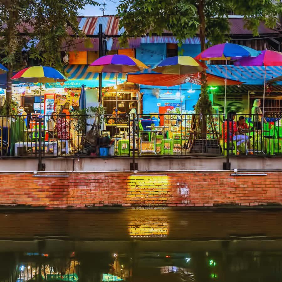 Bangkok Night Tuk Tuk: Private Tour of Markets & Landmarks - Across the river to a quieter temple