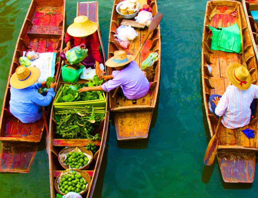 Bangkok: Private Damnoen Saduak Floating & Train Market Tour - Coconut sugar, traditional sweets, and a useful change of pace