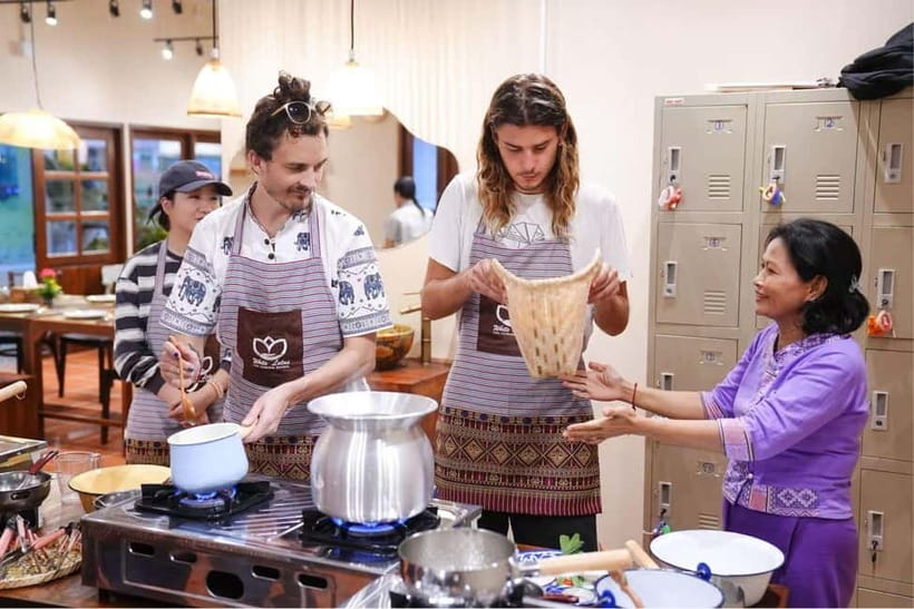 Bangkok: White Lotus Thai Cooking Class with Market Tour - From market ingredients to a home-style kitchen