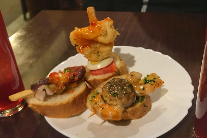 Barcelona Food Tour: Market & Gothic Quarter with Expert Guide - Walking through the Gothic Quarter