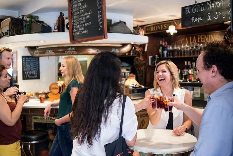 Barcelona: Hidden Markets, Tapas & Paella Food Tour - What the guides add to the walk