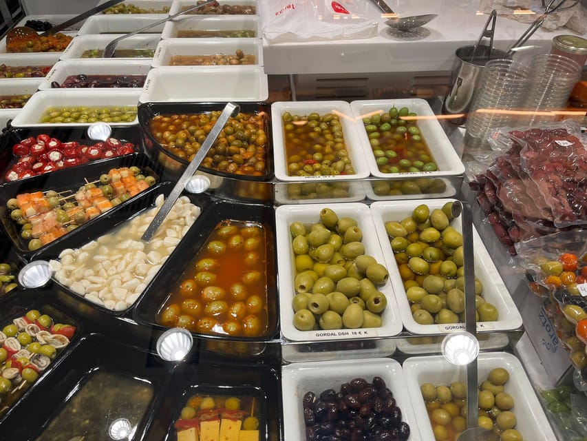 Barcelona: Local Market & Street Food Walking Tour - What the guide adds to the food