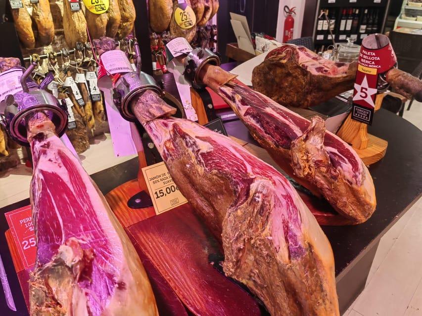 Barcelona: Local Market & Street Food Walking Tour - Jamón, cheese, pinchos, and pastries