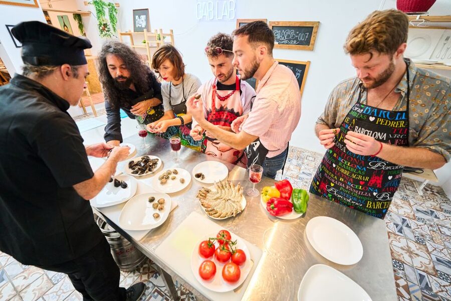 Barcelona: Paella Cooking Class with Market Visit and More - Making sangria, tapas, and dessert