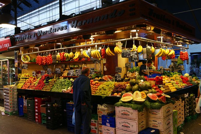 Barcelona : Paella Cooking Experience + Boqueria Market Exclusive Tour - Cooking paella with a working chef
