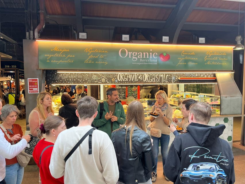 Barcelona: Street Food & Sightseeing Tour with Local Market - Walking from La Rambla into the Gothic Quarter