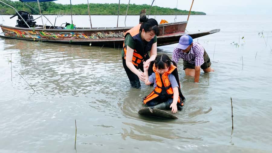 BKK :Meet monkey, mangrove forest, seafood& market -private - Maeklong Railway Market and the train through the stalls