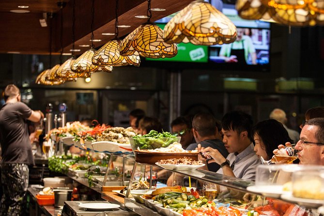 Boqueria & St Caterina Markets with Food & Tapas Small Group Tour - Pintxos and the first round of tasting