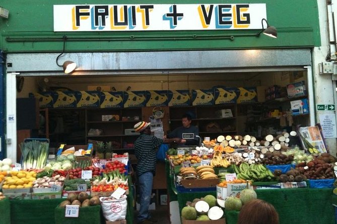 Brixton Market Tour with African and Caribbean Cuisine - Meeting Obi beneath the David Bowie mural