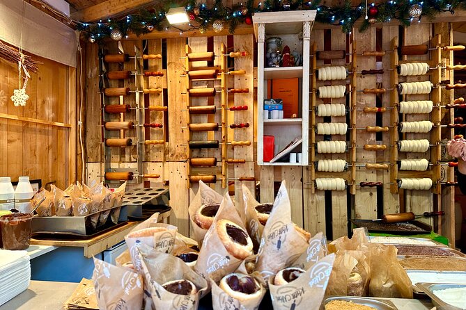 Budapest Wonderland - A Christmas Market Tour with Chimney Cake & Mulled Wine - Gresham Palace and the city between the stalls