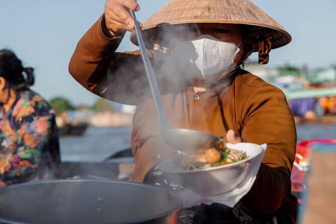 Cai Rang Floating Market Tour & Rural Cycling - Breakfast among the boats at Cai Rang