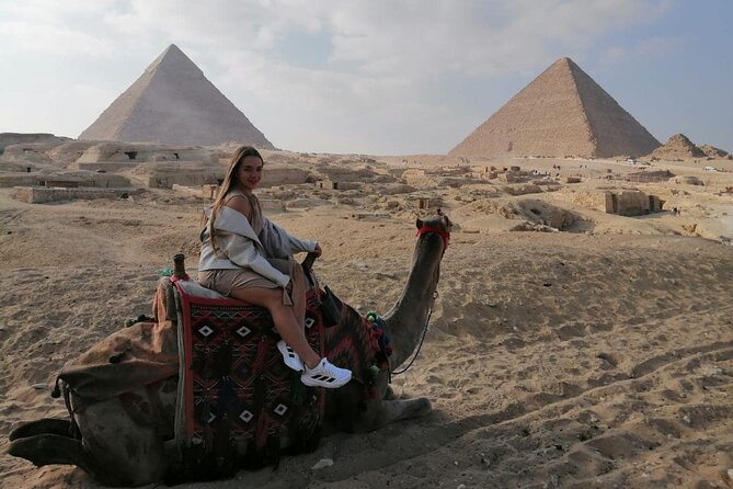 Cairo layover tour Giza pyramids Egyptian museum local bazaars Camel ride Lunch - Meeting your guide at Cairo Airport