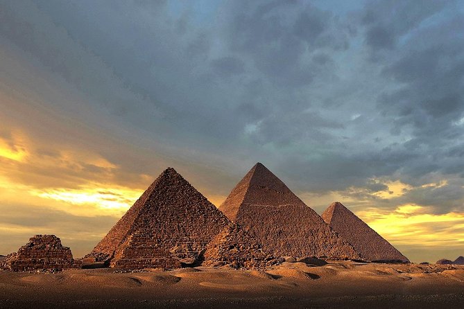 Cairo Stopover Tour to Giza Pyramids Egyptian Museum Citadel & Bazaar - Entering a pyramid or riding a camel