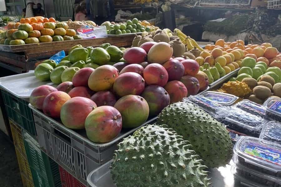 Cali: Fruit Market Walking Tour with Tastings - Entering Galeria Alameda’s produce stalls