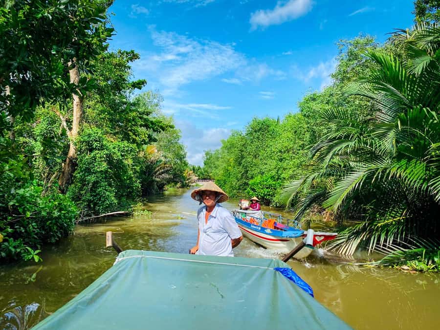 Can Tho: A Real Mekong Tour, Floating Market, Cacao & Life's - Meeting local boats and tasting pineapple on the river