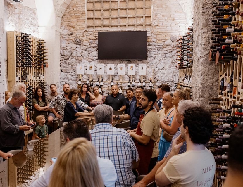 Catania: Volcanic Wine Tasting in a Metropolitan Market - Four glasses and the food that comes with them