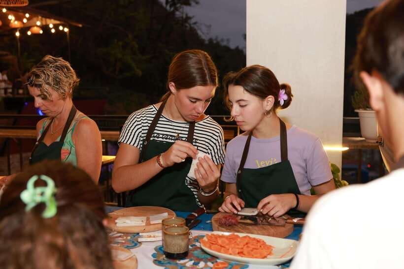 CatBa: Authentic Vietnam Cooking Class and local market tour - Learning the dishes at Linda Kitchen