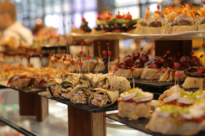 CERTAL Exclusive Tour: LA RIBERA Market + GASTROBARS Bilbao (3h) - Weather, cancellation, and booking ahead