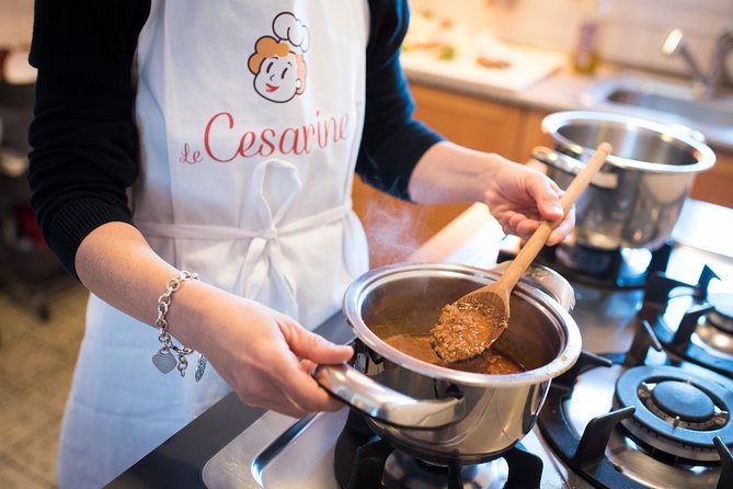 Cesarine: Market Tour & Cooking Class at Local's Home in Bologna - Sitting down to a Bolognese meal