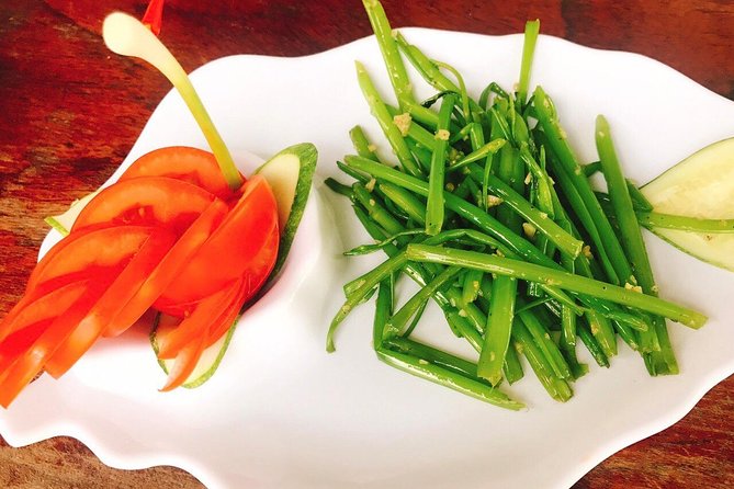 Chef Vu Cooking Class Plus Market Trip in Saigon Center (Pick up by Cyclo) - Sitting down to eat what you prepared