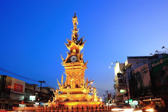 Chiang Rai Food & Night Market Walking Tour with Local Host - The golden Clock Tower after sunset
