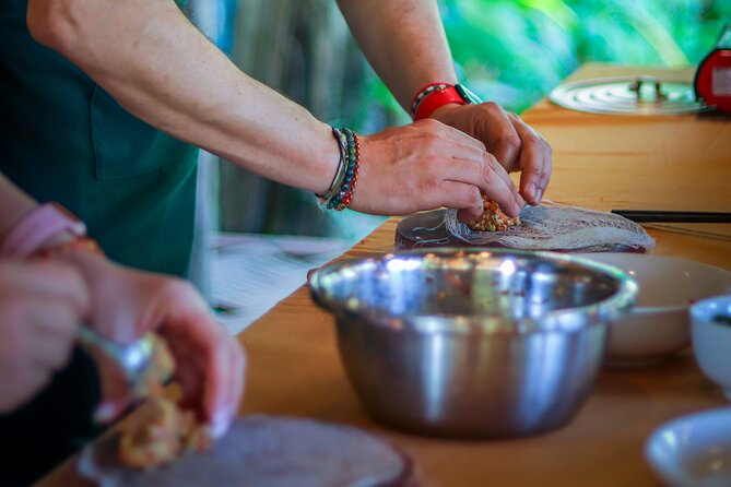Cocolocal Farm Cooking Class with market tour and basket boat - Cooking Banh Xeo, Pho, salad, and spring rolls