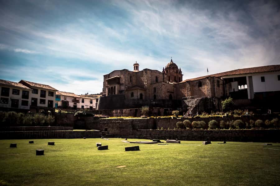 Cusco: Coricancha, Cathedral & San Pedro Market Walking Tour - Coricancha: where Inca stonework meets a Spanish convent