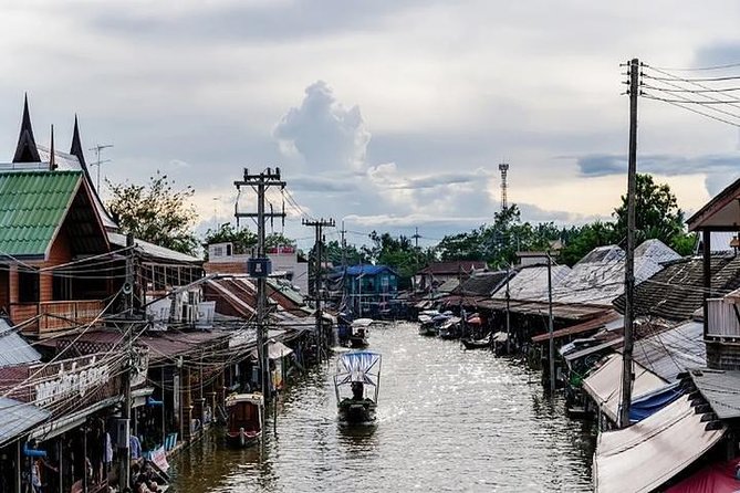 Damnoen Floating Market & Optional Erawan Water Waterfall Tour - Maeklong Railway Market and the passing train