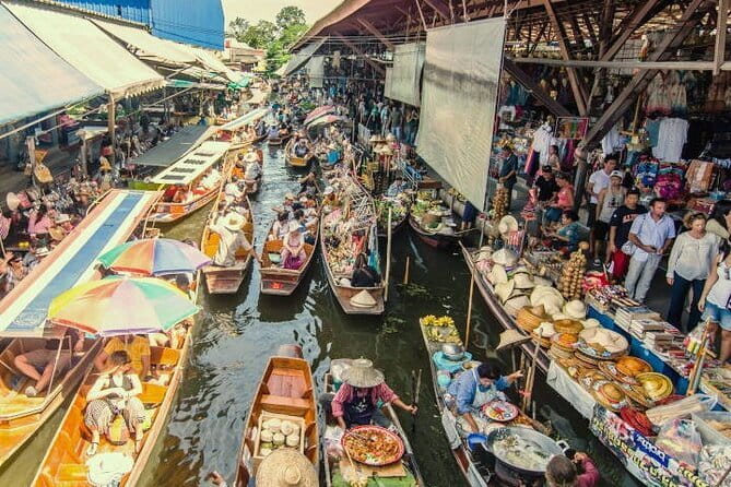 Damnoen Saduak Floating Market & Railway Market Tour from Bangkok - What the guide adds