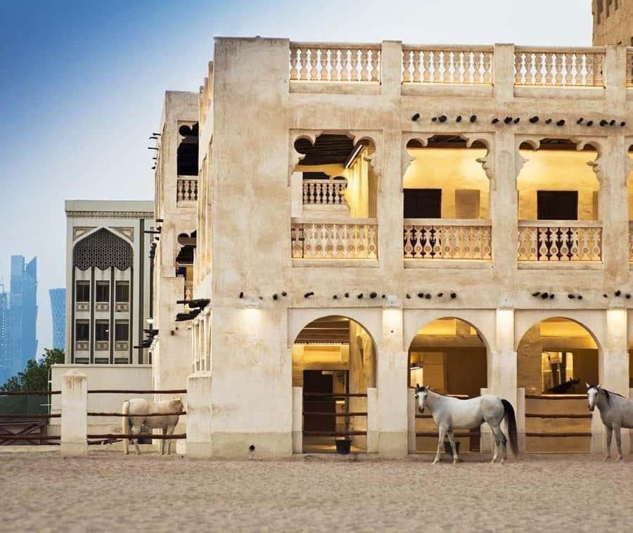Doha: Souq Waqif Tour & Curated Walk with Guide - Perfumes, textiles, and traditional wear