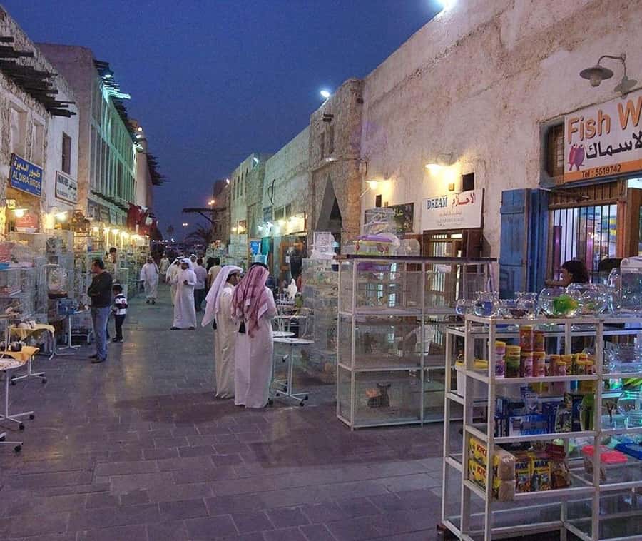 Doha: Souq Waqif Tour & Curated Walk with Guide - Traditional clothing and photographs