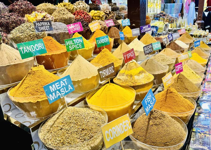 Dubai: Authentic Old Town, Souks, Tastings & Abra Boat Tour - Walking through old houses and heritage lanes