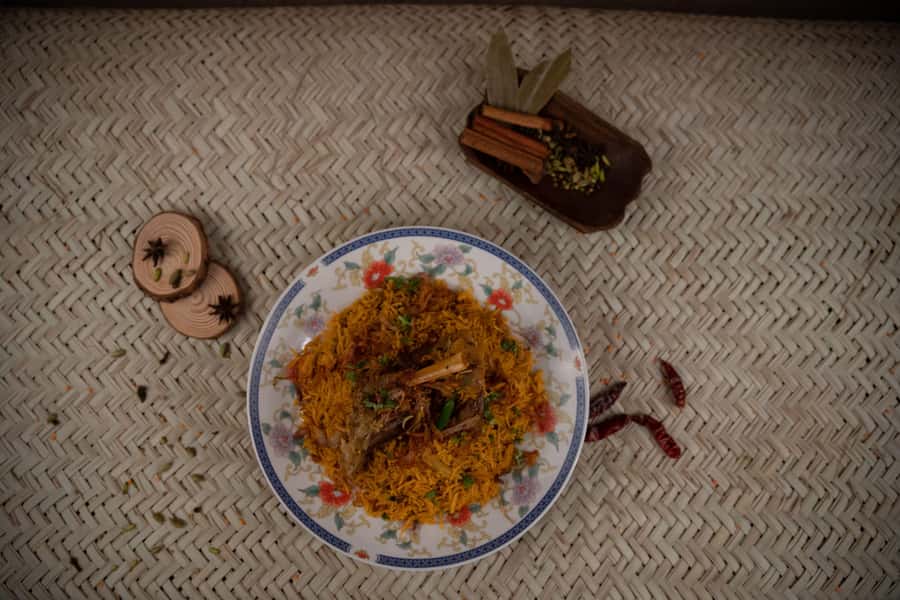 Dubai Food Tour: 4 Cuisines, Souks & Street Bites - Emirati food inside Al Khayma Heritage Restaurant