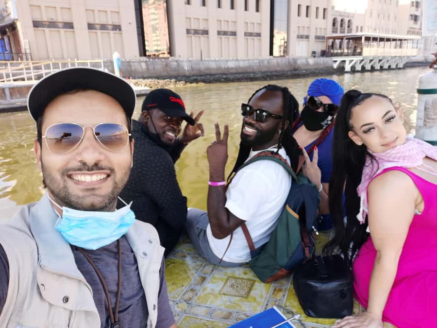 Dubai Old Town, Creek, Abra boat, Souks Guided walking Tour - Crossing Dubai Creek by abra