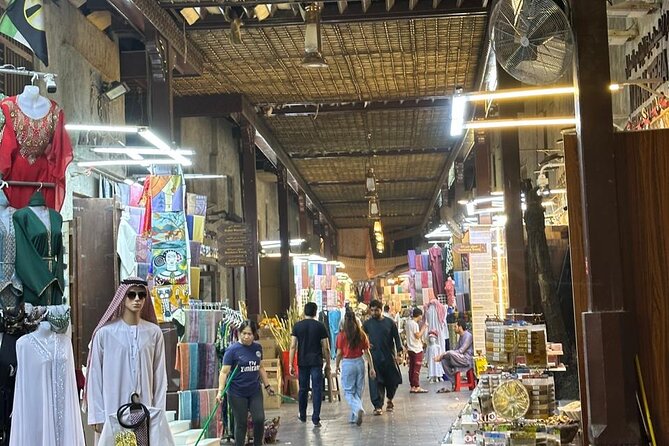 Dubai Old Town Walking Tour with Abra ride, Spice and Gold Souk - Finishing beneath the Gold Souk signs