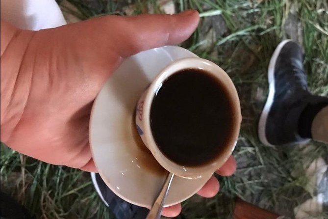 Ethiopian Culinary Tour - Market, Food, Coffee Ceremony & more - Tomoca Coffee and lunch at Taitu Hotel