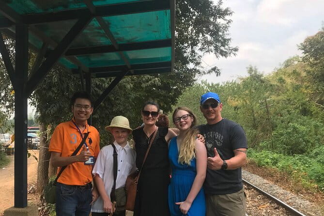 Floating and Railway Markets and Erawan Waterfall (Group Tour) - Mae Klong Railway Market and the passing train