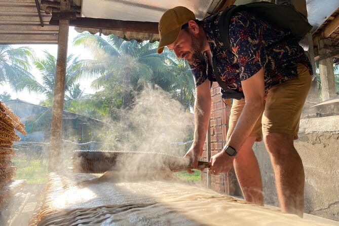 Floating Market & Hidden Canals – Small Group Morning Boat Tour - Making noodles at Lò hủ tiếu Chín Của