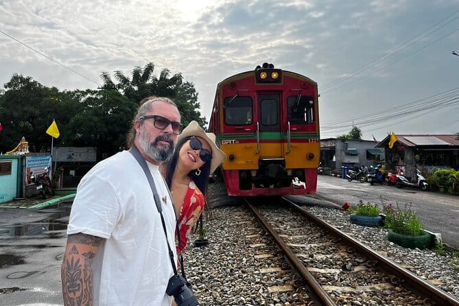 Floating & Railway Markets Tour - Riding the train to Mae Klong Railway Market