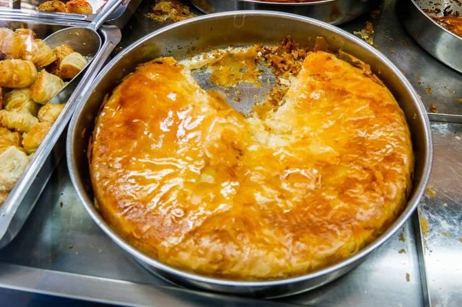 Food Tasting at Locals Favorite Farmers Market in Belgrade - Hot burek at the old family bakery