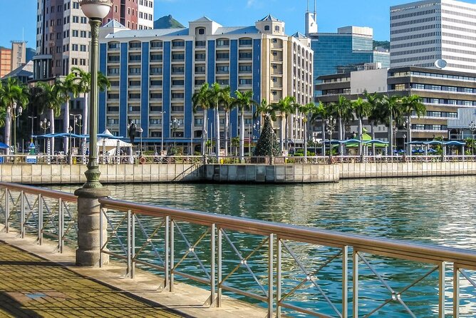 Food Tasting & Market Shopping: Private Guided Tour in PORT LOUIS - Champ de Mars adds a piece of British-era history