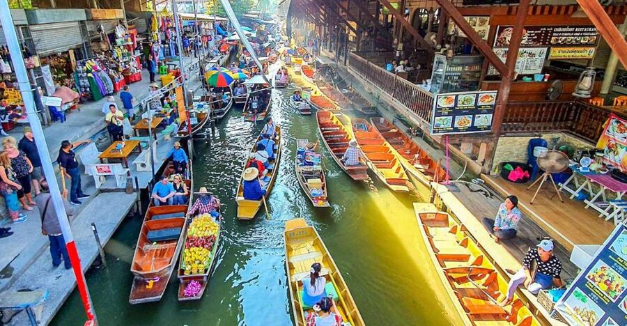From Bangkok: Damnoen Saduak & Train Market Tour in Spanish - Leaving Bangkok around 7 AM
